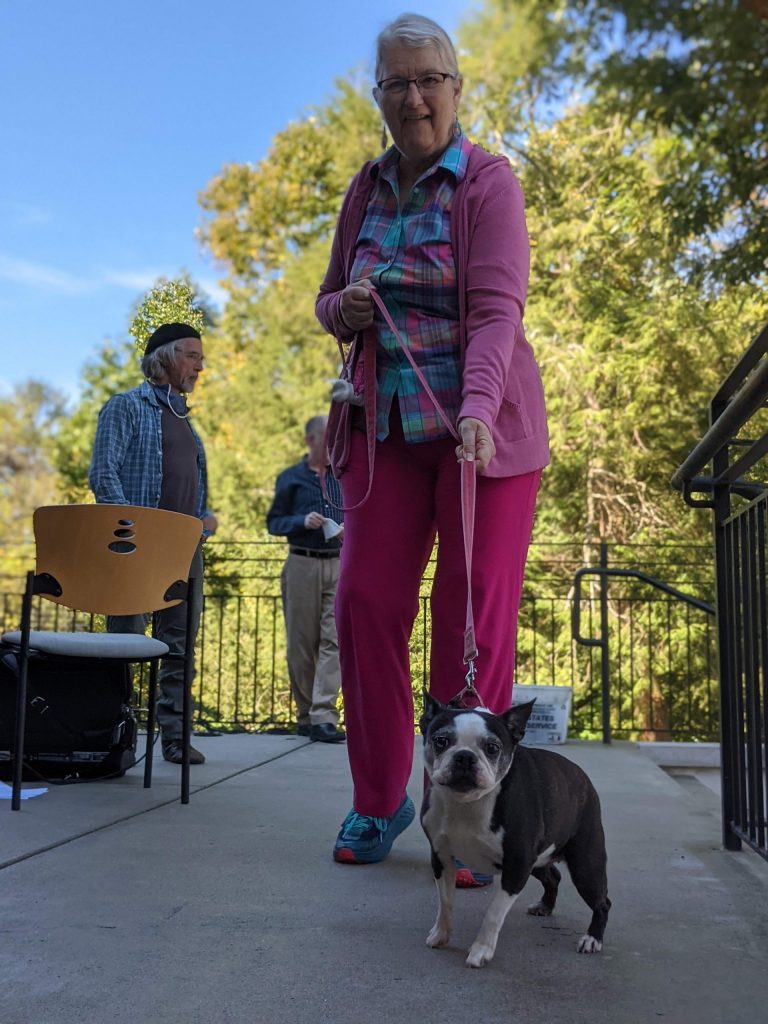 Female congrgants with English bulldog